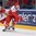 MINSK, BELARUS - MAY 17: Denmark's Oliver Lauridsen #25 chases after the puck with pressure from Czech Republic's Jiri Hudler #24 during preliminary round action at the 2014 IIHF Ice Hockey World Championship. (Photo by Richard Wolowicz/HHOF-IIHF Images)

